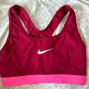 Red and pink Nike women’s sports bra